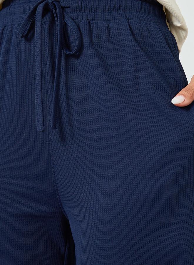 ستايلي بنطال جوغر بأرجل واسعة ورباط - Image 2